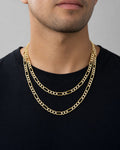 Male model wearing 14K 5.2MM Two-Tone Figaro Link Chain 18-20"
