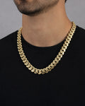 Male model wearing 14K 12.5MM Cuban Link Chain 18"