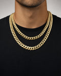 Male model wearing 14K 8MM Cuban Link Chain 16-20"
