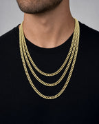 Male model wearing 14K 6MM Cuban Link Chain 20-24"