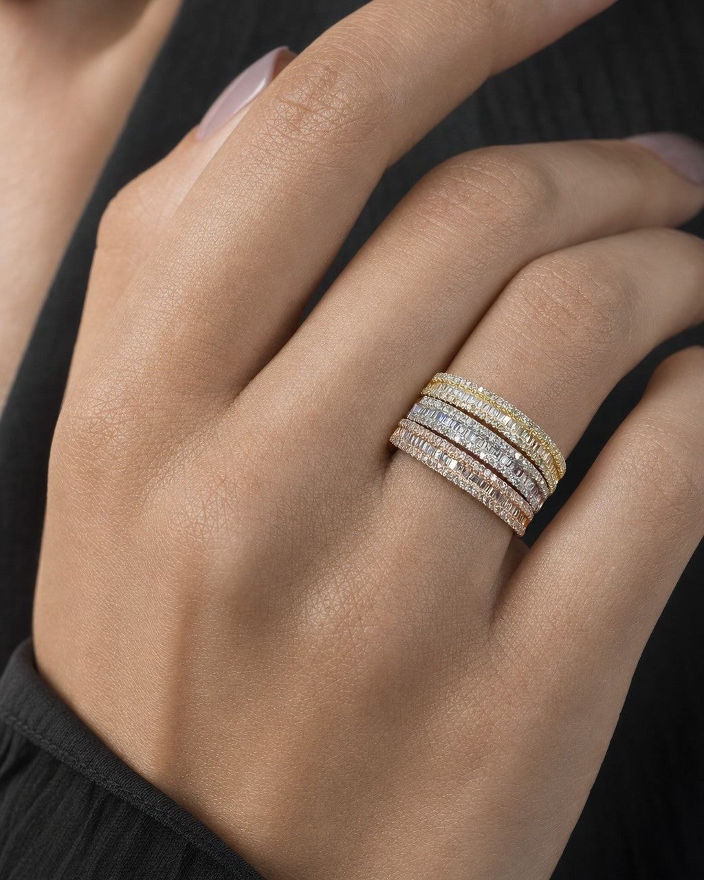 Female model wearing 10K Diamond Baguette Half-Way Eternity Band Ring