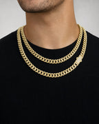 Male model wearing 14K 7MM Cuban Link Chain 16-18"