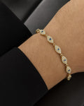Male model wearing 14K Evil Eye Link Diamond Bracelet 7"