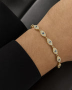 Male model wearing 14K Evil Eye Link Diamond Bracelet 7"