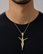 Male model wearing 14K Crucified Jesus Diamond Pendant