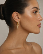 Female model wearing 14K Pave Dagger Diamond Hoop Earrings