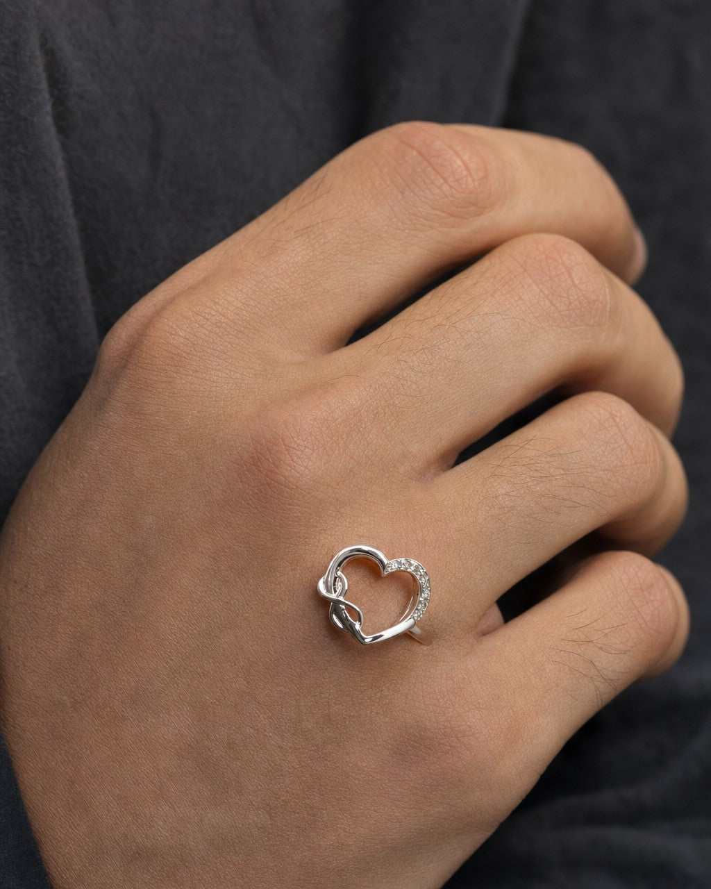 Male model wearing 14K Heart Infinity Diamond Ring