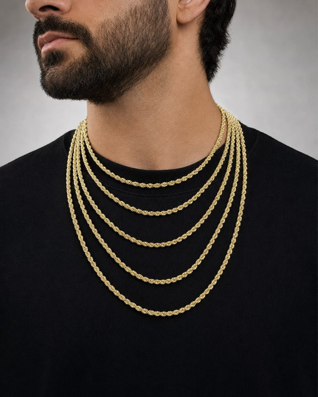 Male model wearing 10K Yellow Gold 4MM Rope Chain 16-24"