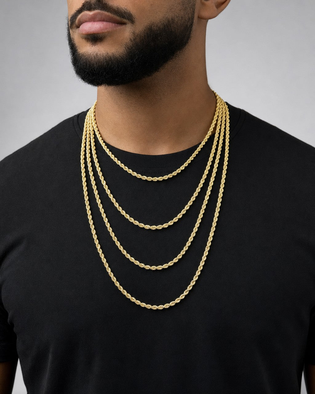 Male model wearing 10K Yellow Gold 3MM Rope Chain 16-24"