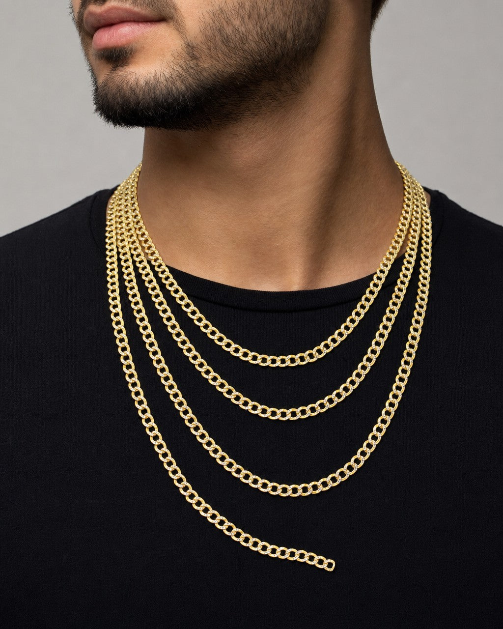 Male model wearing 14K 5.5MM Two Tone Cuban Link Chain 18-24"