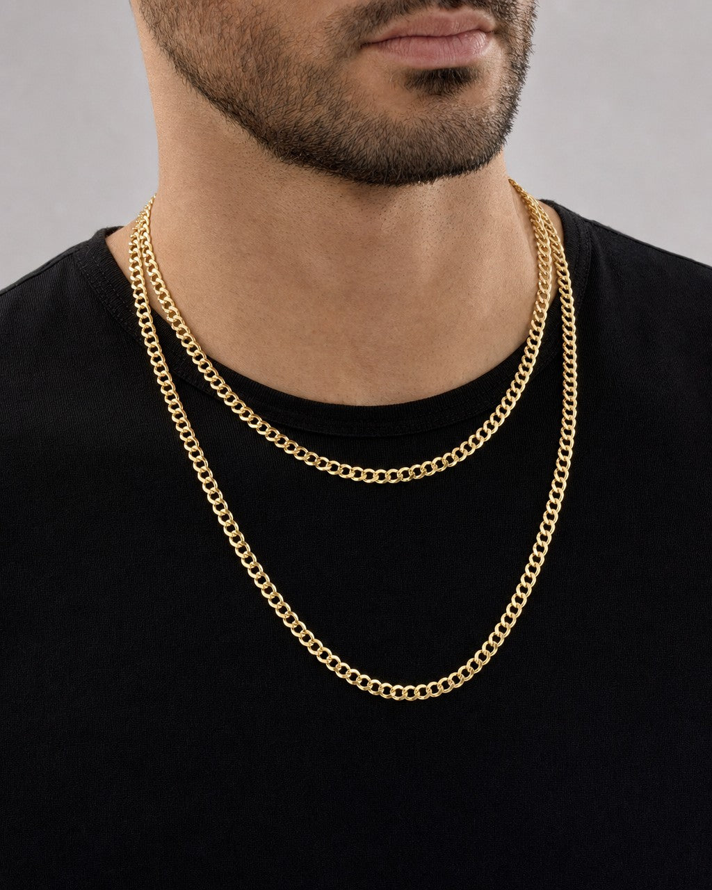 Male model wearing 10K Gold 5MM Cuban Link Chain 16-24"