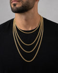 Male model wearing 10K 4MM Flat Cuban Link Chain 16-26"