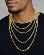 Male model wearing 4.8MM Two-Tone Flat Cuban Link Chain 16-26"