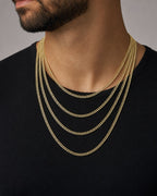 Male model wearing 3.5MM Two-Tone Flat Cuban Link Chain 16-24"