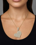 Female model wearing 14K Jumbo Heart Halo Pendant