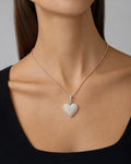 Female model wearing 10K Halo Heart 3D Diamond Pendant