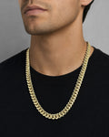 Male model wearing 14K 9.5MM Cuban Link Chain 22"