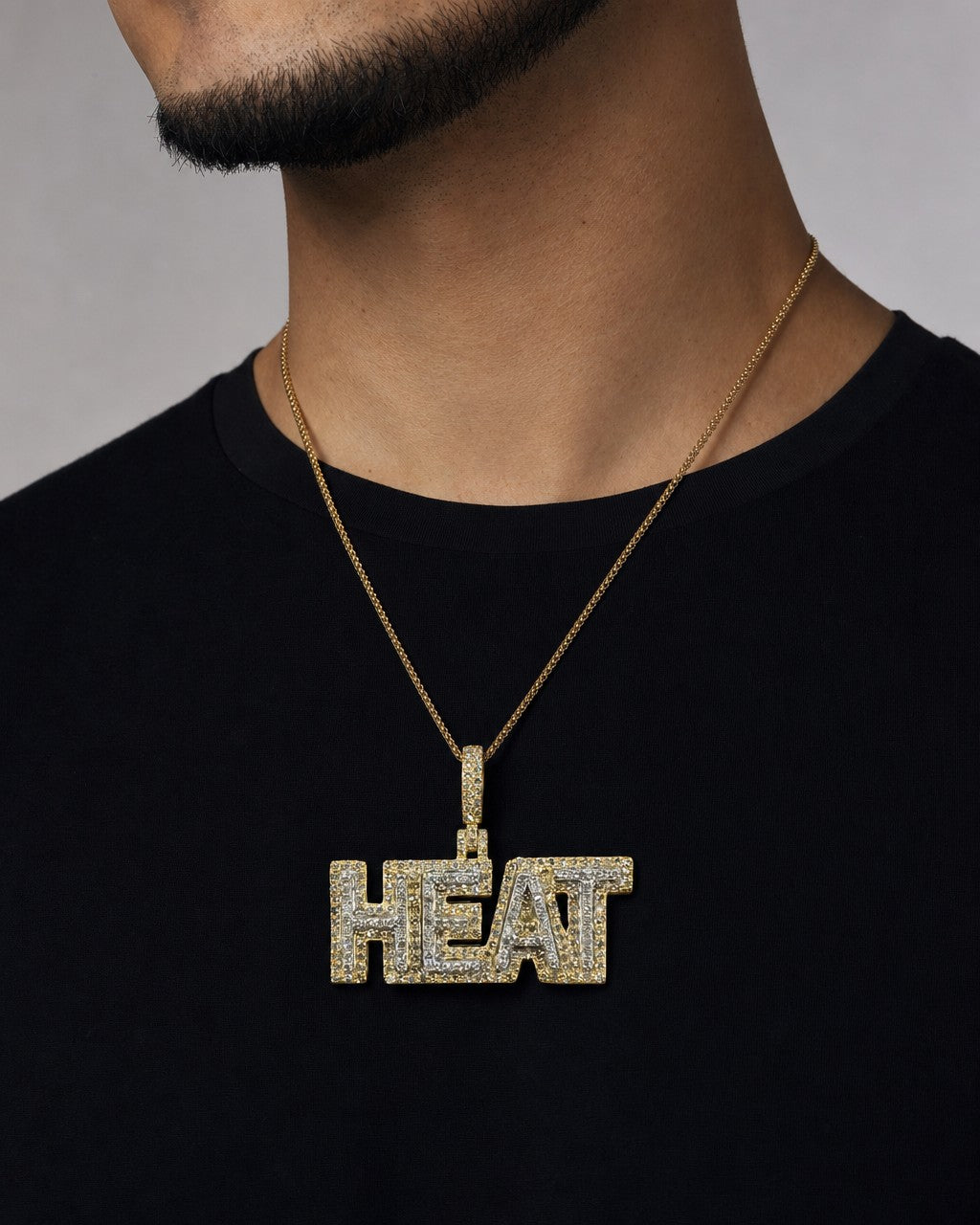 Male model wearing 10K Heat Name Plate Pendant