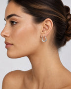 Female model wearing 14K Vegas Hoop Earrings