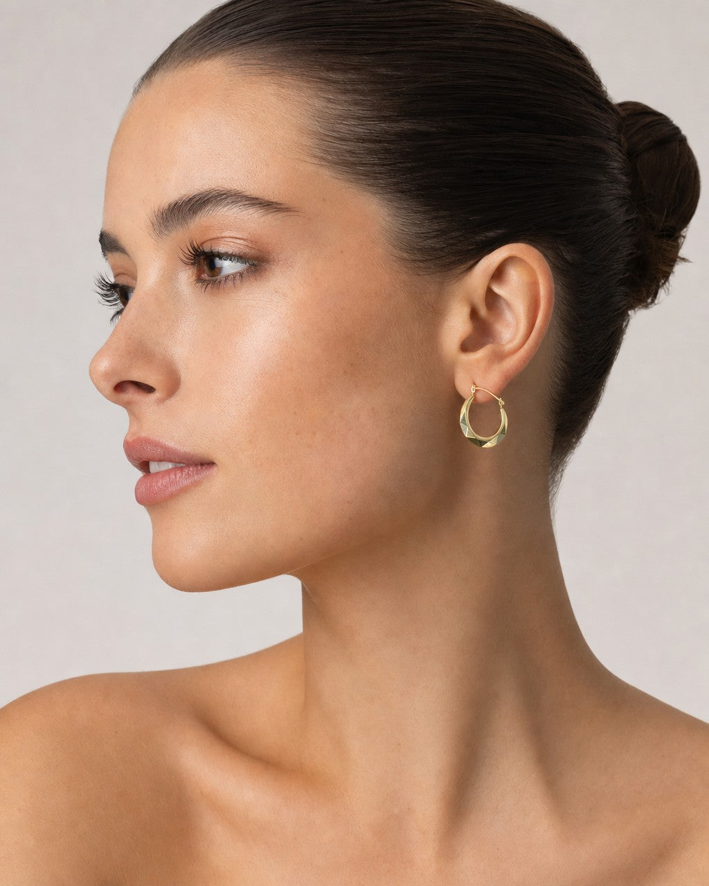 Female model wearing 14K Geometric Hoop Earrings