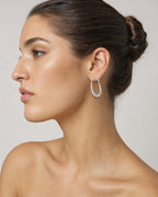 Female model wearing 14K Ruffle Hoop Earrings