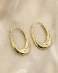 14K Ribbon Hoop Earrings styled photo