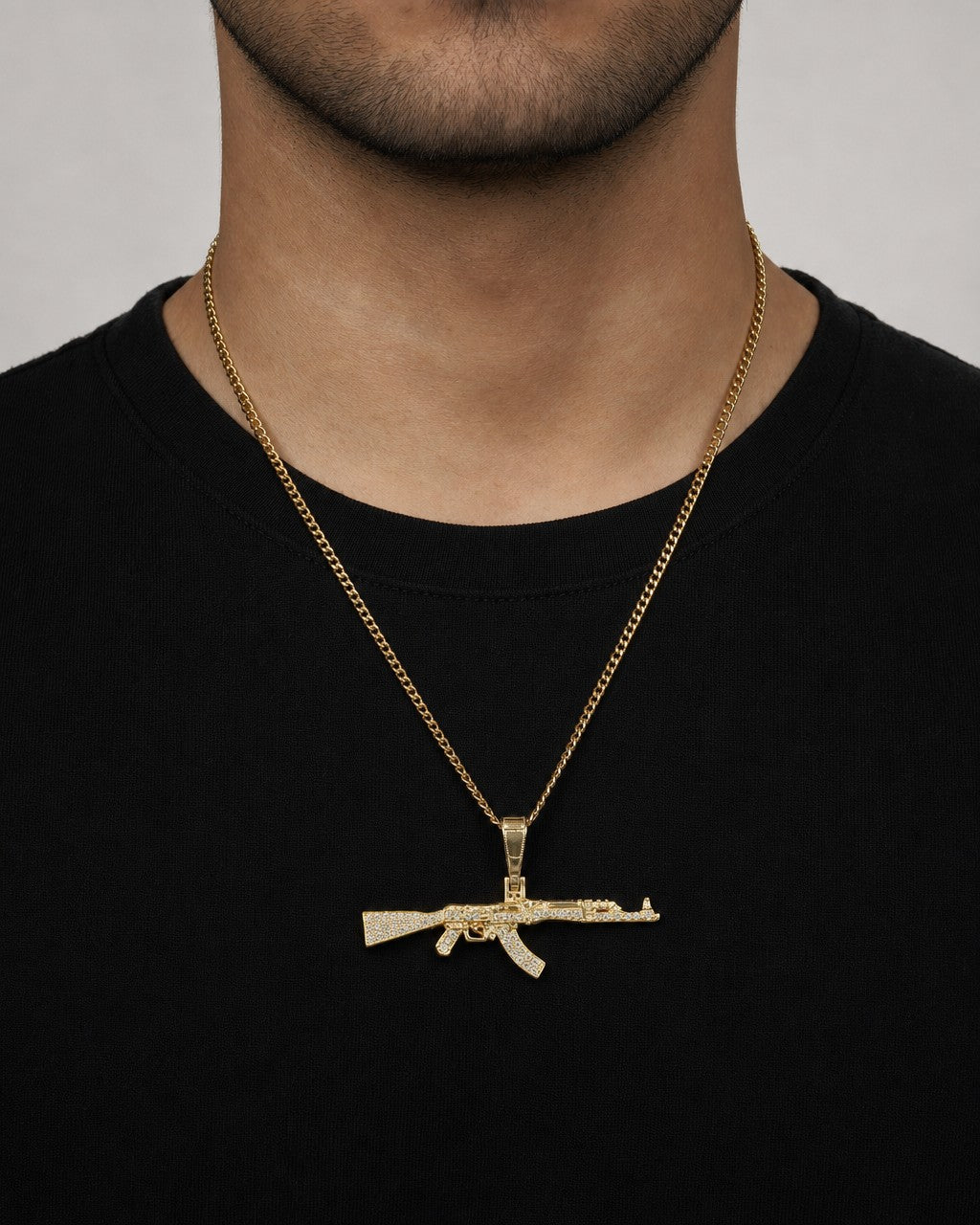 Male model wearing 10K AK-47 Gun Diamond Pendant