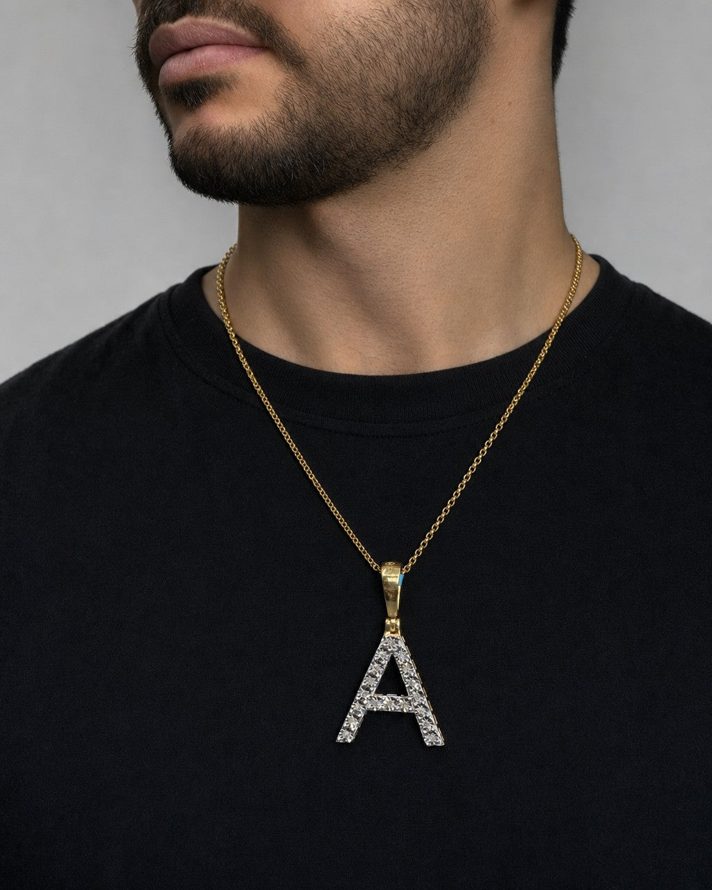 Male model wearing Pave Initial Letter Diamond Pendants Full Collection