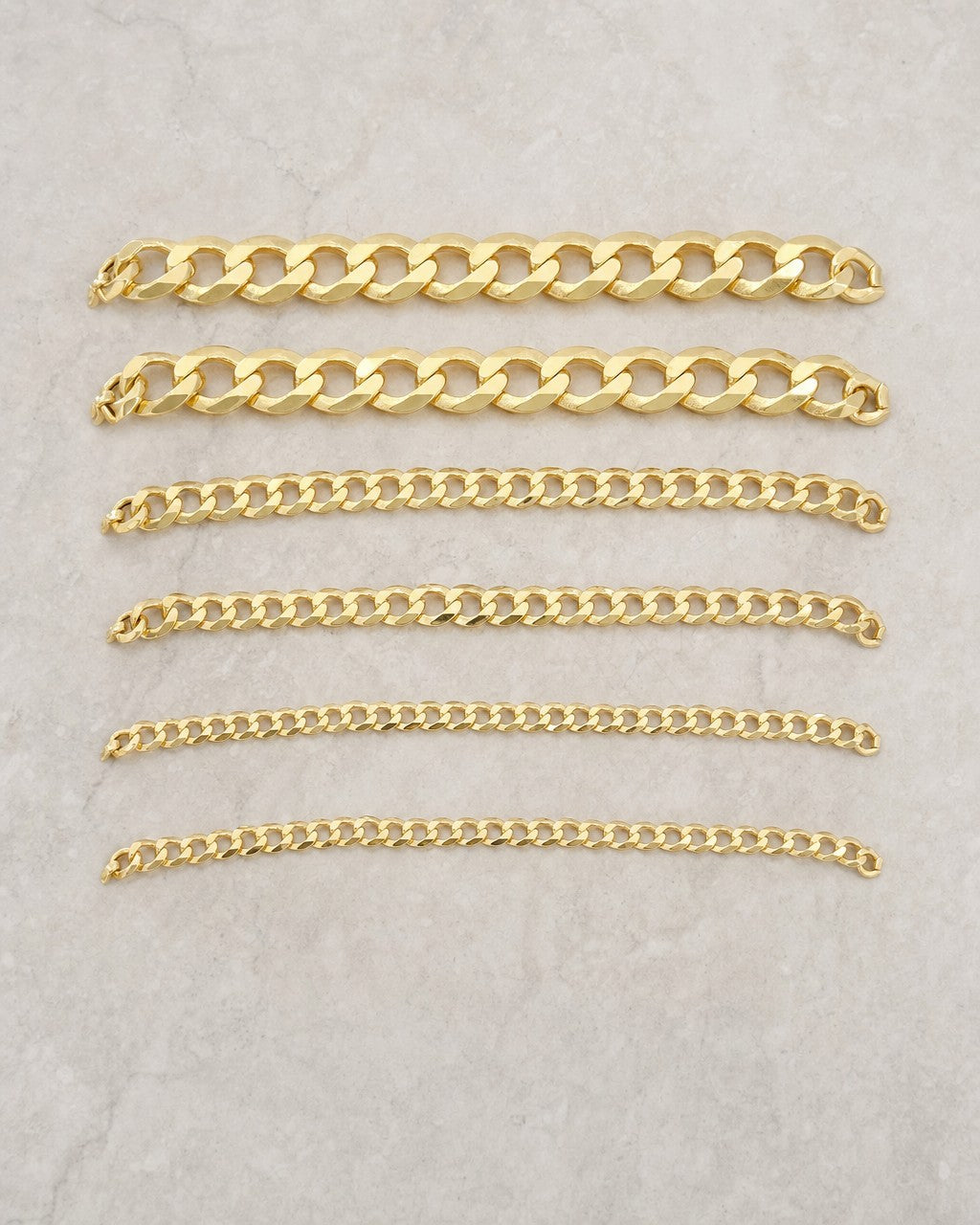 10K Flat Cuban Link Anklet styled photo