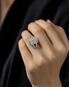 Female model wearing 14K Square Halo Diamond Engagement Ring with Stack Band