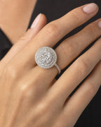Female model wearing 14K Jumbo Cake Circle Diamond Engagement Ring