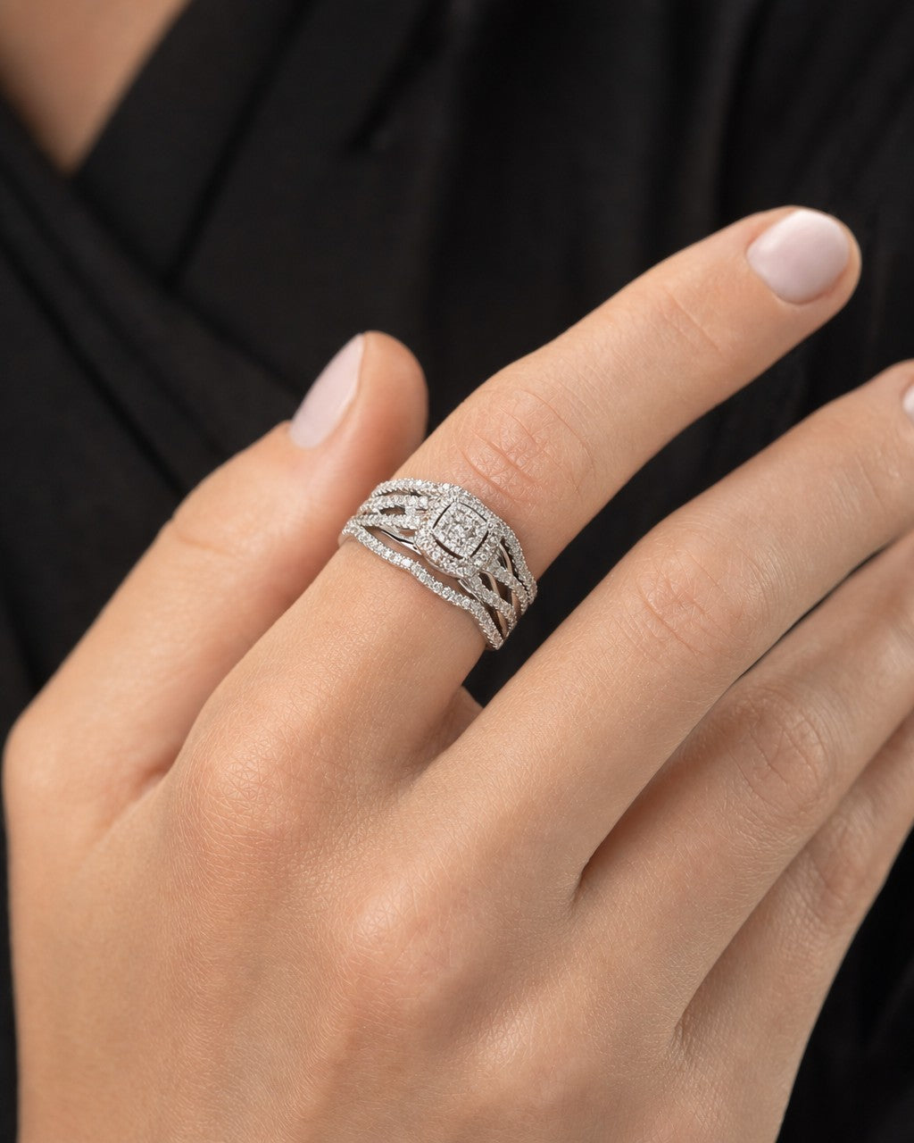 Female model wearing 14K Romance Square Diamond Engagement Ring with Stack Bands