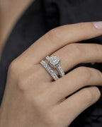 Female model wearing 14K Bloom Circle Diamond Engagement Ring with Stacking Band