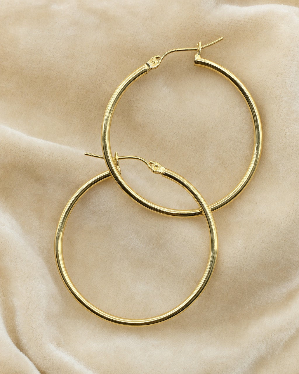 10K Yellow Gold Hoop Earrings (2.2MM) styled photo