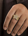 Male model wearing 14K Rising Star Diamond Ring