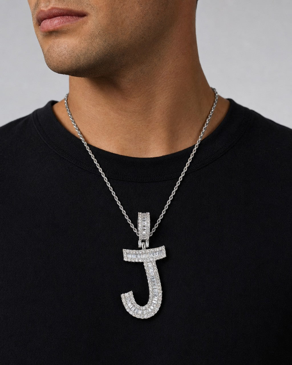 Male model wearing 14K Initial J Diamond Baguette Pendant