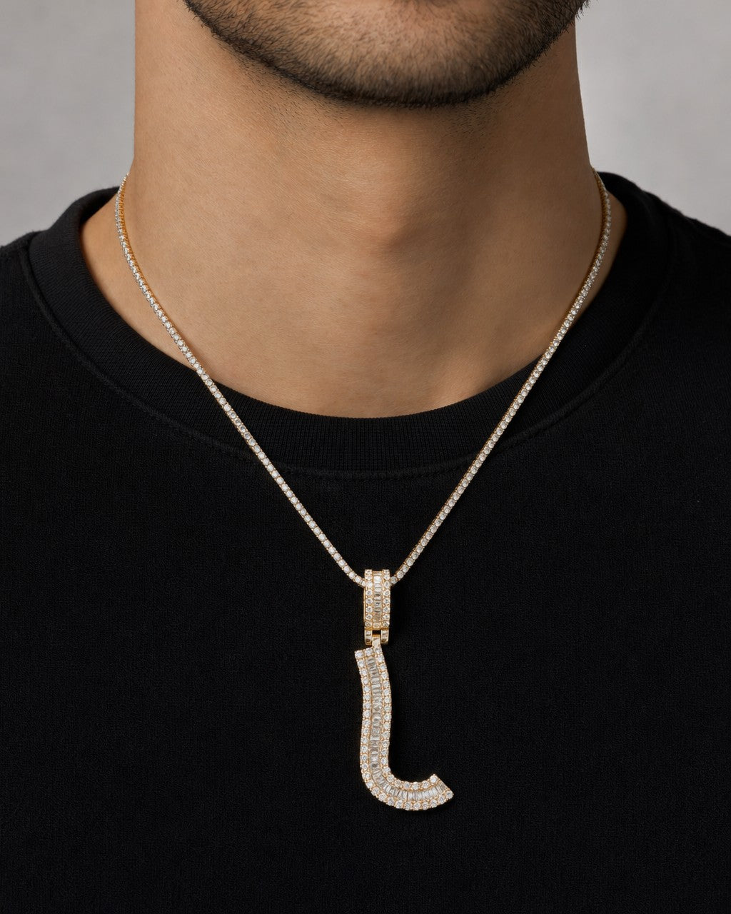Male model wearing 14K Initial U Diamond Baguette Pendant