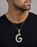 Male model wearing 14K Initial G Diamond Baguette Pendant