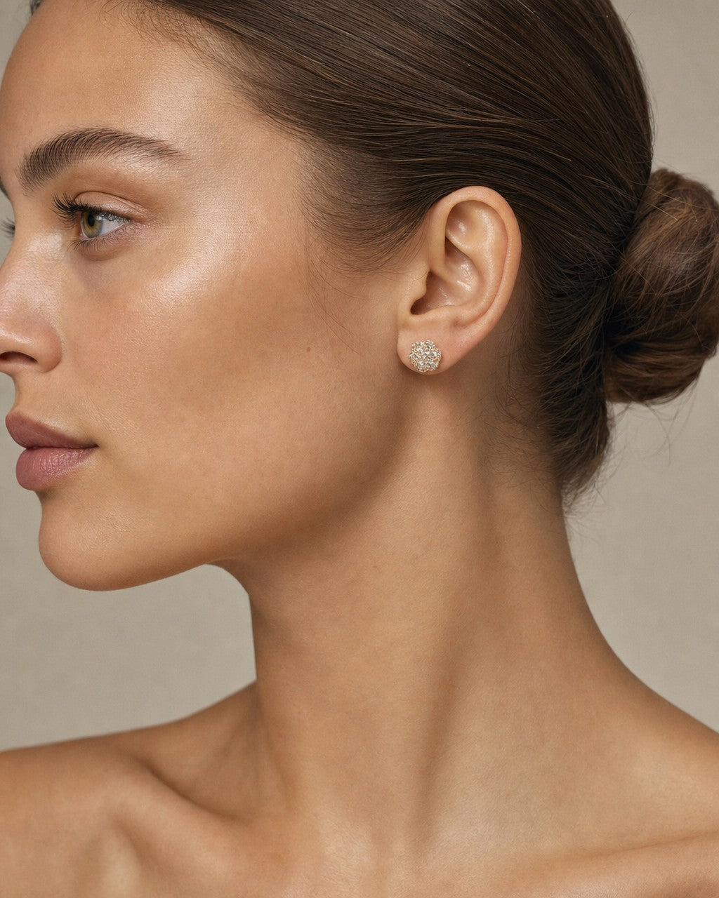 Female model wearing 14K Hexagon Flower Diamond Earrings