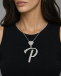 Female model wearing 14K Initial P Script Heart Diamond Pendant