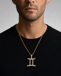Male model wearing 10K Gemini Sign Diamond Pendant