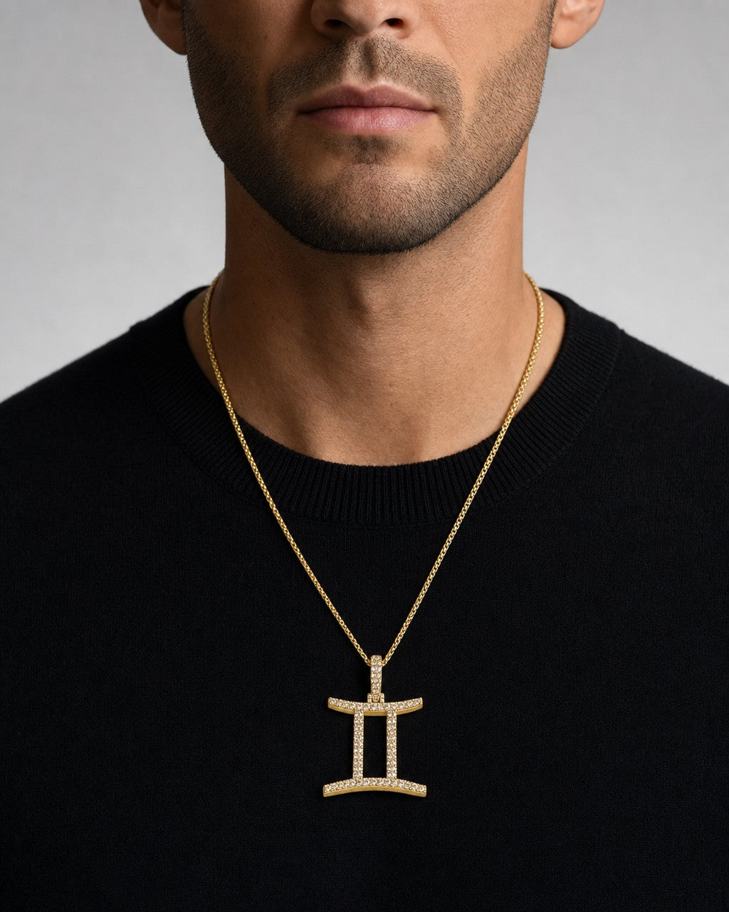 Male model wearing 10K Gemini Sign Diamond Pendant