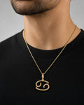 Male model wearing 10K Cancer Sign Diamond Pendant
