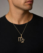 Male model wearing 10K Virgo Sign Diamond Pendant