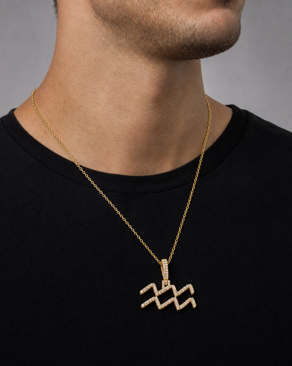 Male model wearing 10K Aquarius Sign Diamond Pendant