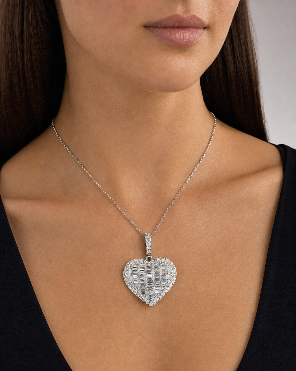 Female model wearing 14K Heart Baguette Diamond Pendant