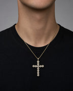 Male model wearing 14K Fate Cross Diamond Pendant
