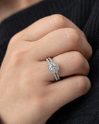 Female model wearing 14K Adore Halo Circle Diamond Engagement Ring
