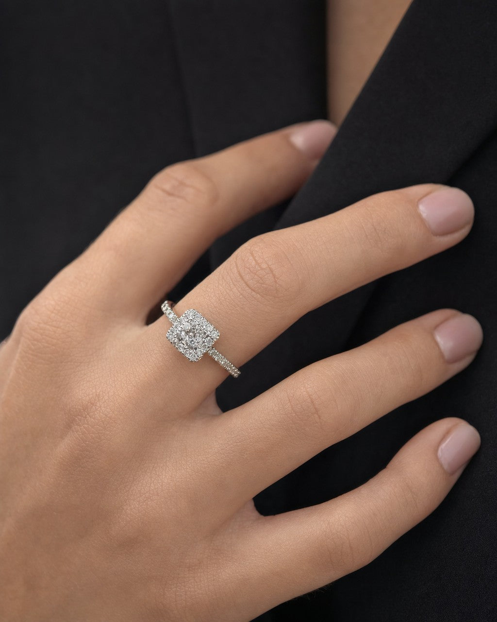 Female model wearing 14K Lucia Rounded Square Diamond Engagement Ring