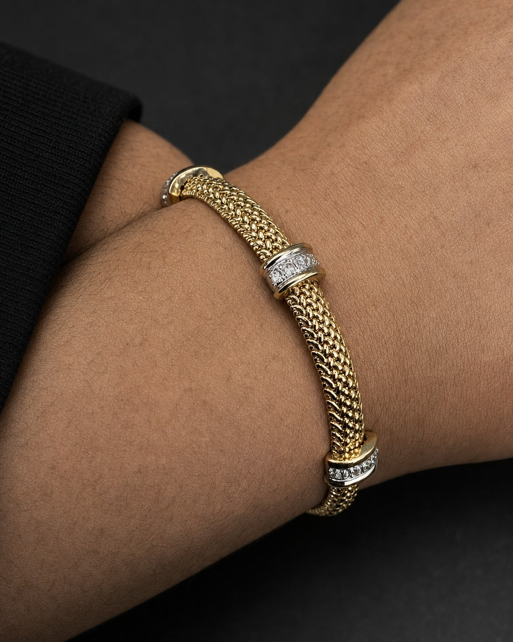 Male model wearing 14K Gold Braided Diamond Bracelet